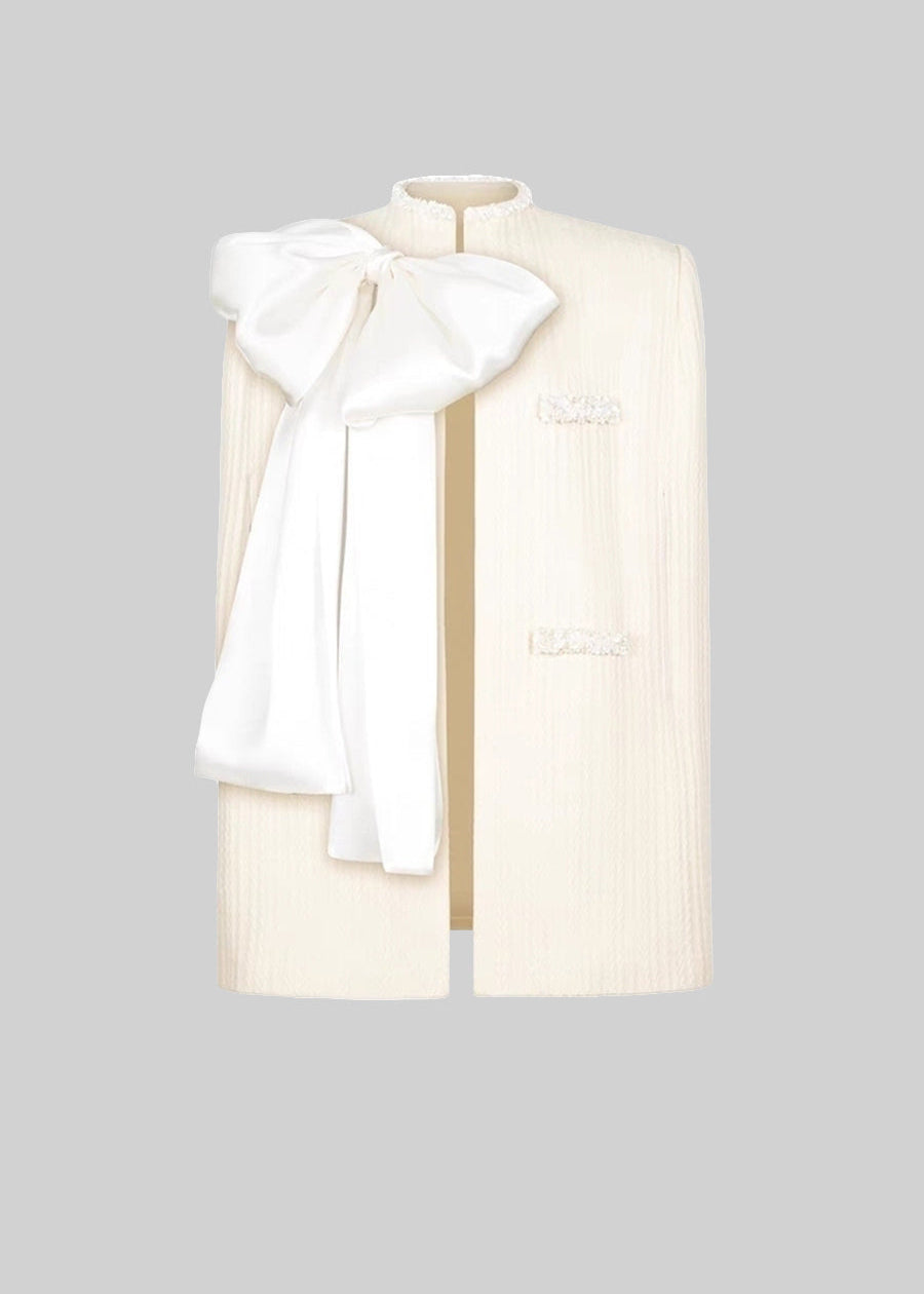Elegant Textured Overcoat With White Bow Detail - Ivoire